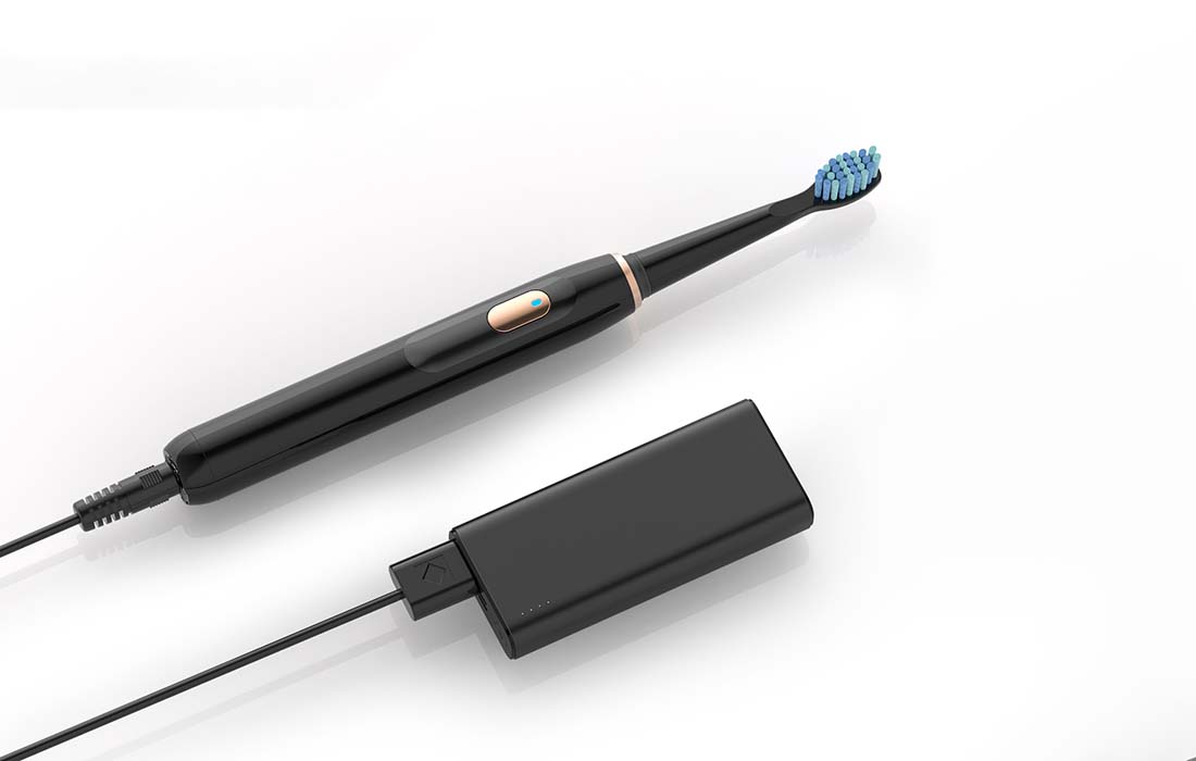Image de la brosse à dents en cours de chargement via USB