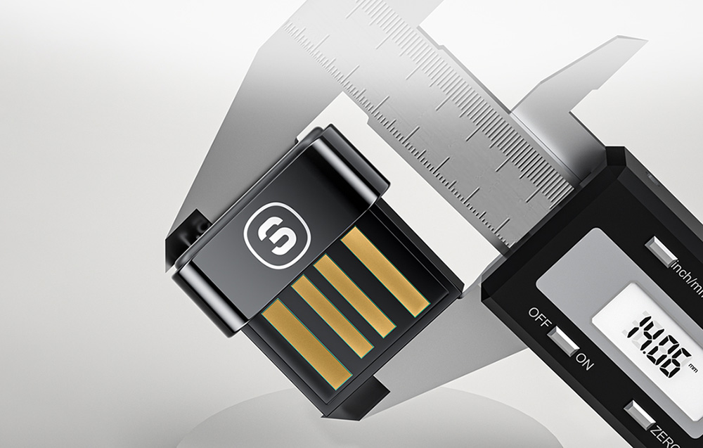 Adaptateur USB Bluetooth 5.1 Essager à côté d'une règle.